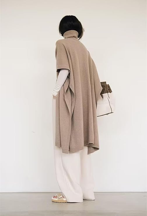 Women's Cashmere Wool Poncho: Elegant solid-color long cloak sweater featuring a cozy high-neck cape design. Perfect for fashionable and warm winter layering.