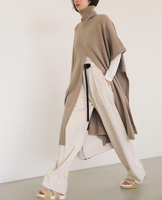 Women's Cashmere Wool Poncho: Elegant solid-color long cloak sweater featuring a cozy high-neck cape design. Perfect for fashionable and warm winter layering.