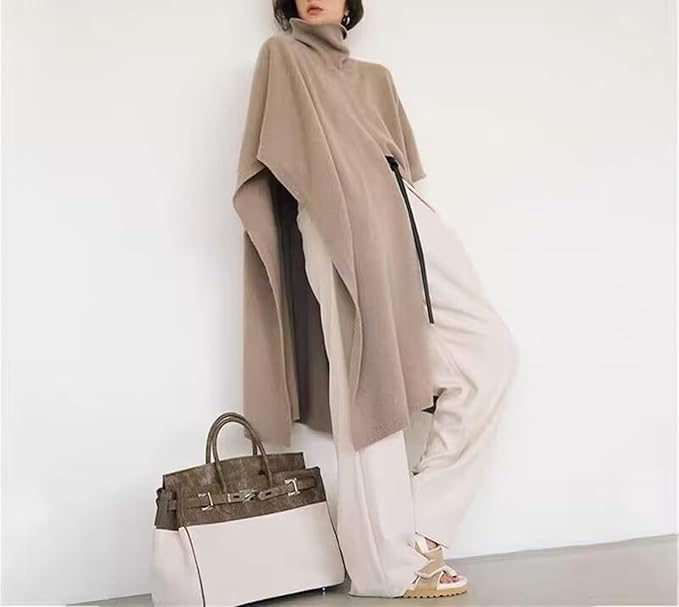 Women's Cashmere Wool Poncho: Elegant solid-color long cloak sweater featuring a cozy high-neck cape design. Perfect for fashionable and warm winter layering.
